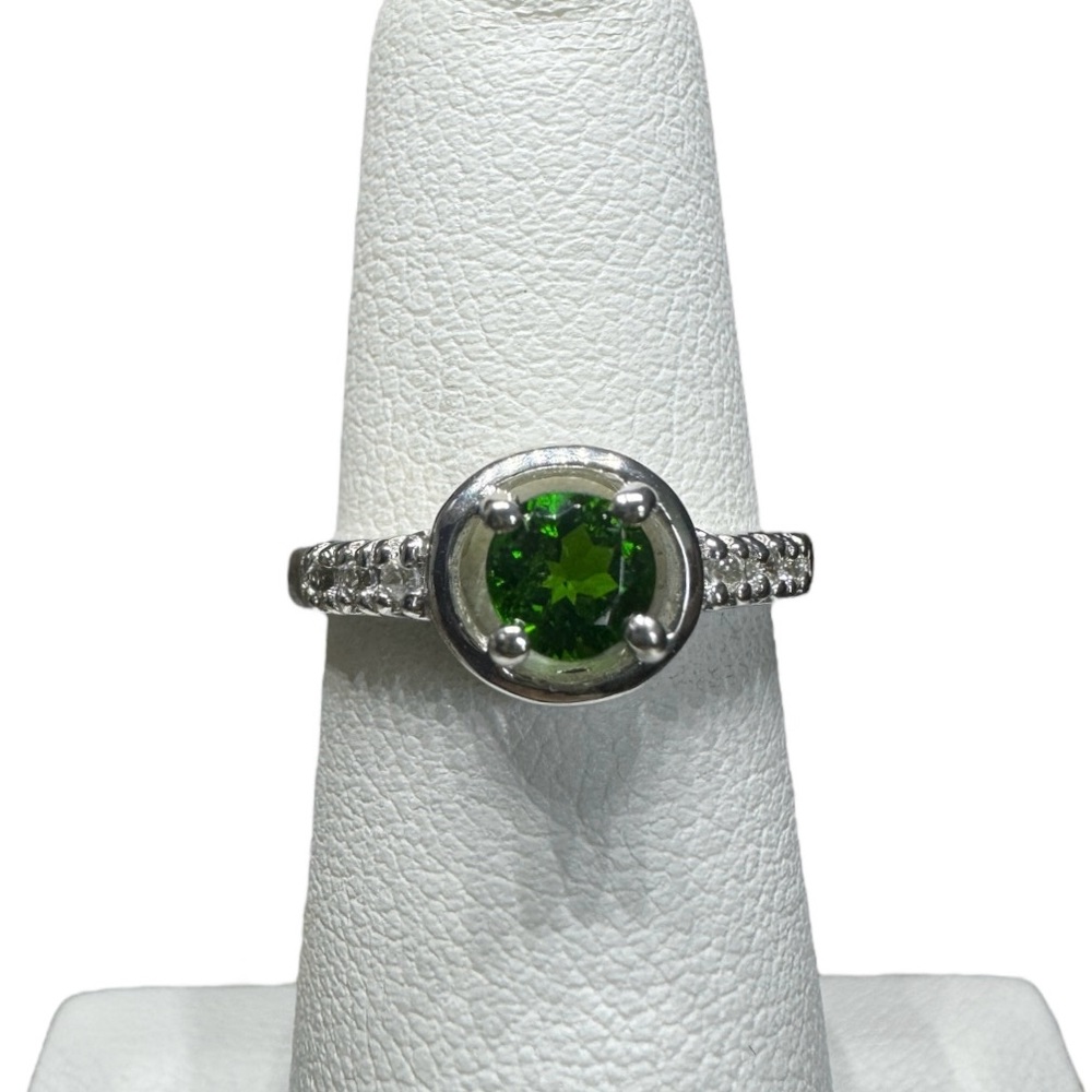 Silver and green satellite ring